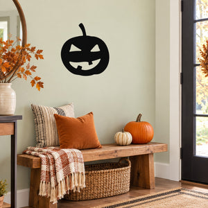Black jack-o-lantern face wall decal with smirking grin, carved eyes and mouth