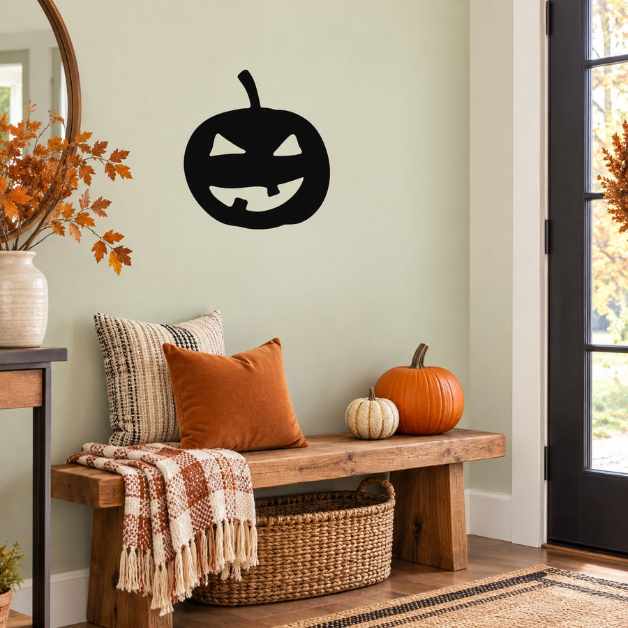 Black jack-o-lantern face wall decal with smirking grin, carved eyes and mouth