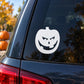 White jack-o-lantern evil grin decal for car window, round sticker with black face