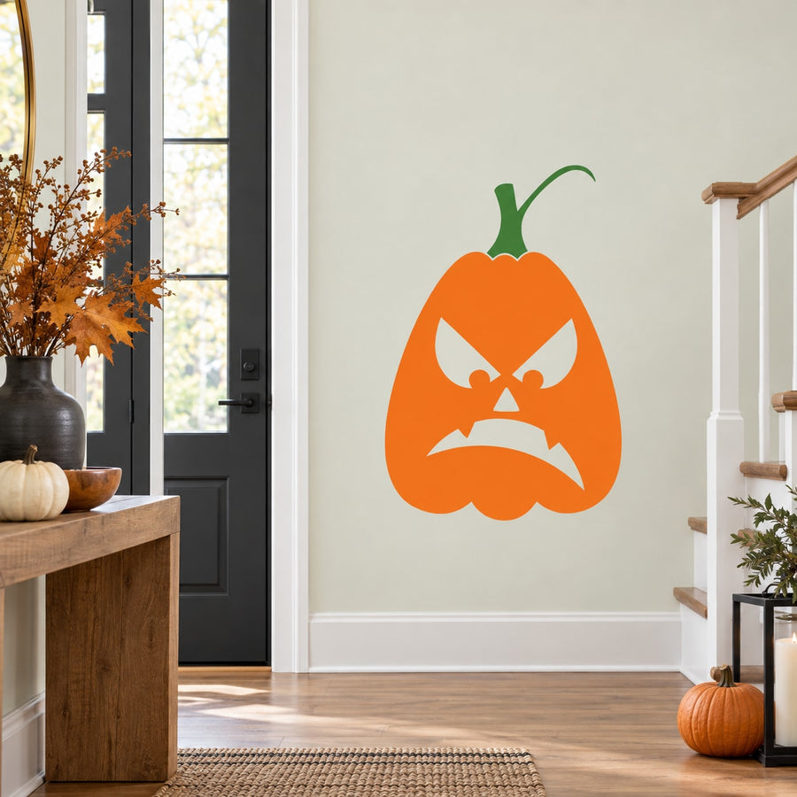 Orange jack-o-lantern decal with green stem and angry frown face, Halloween wall sticker