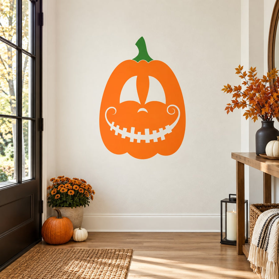 Jack-o-lantern pumpkin wall decal with green stem and curved smile face
