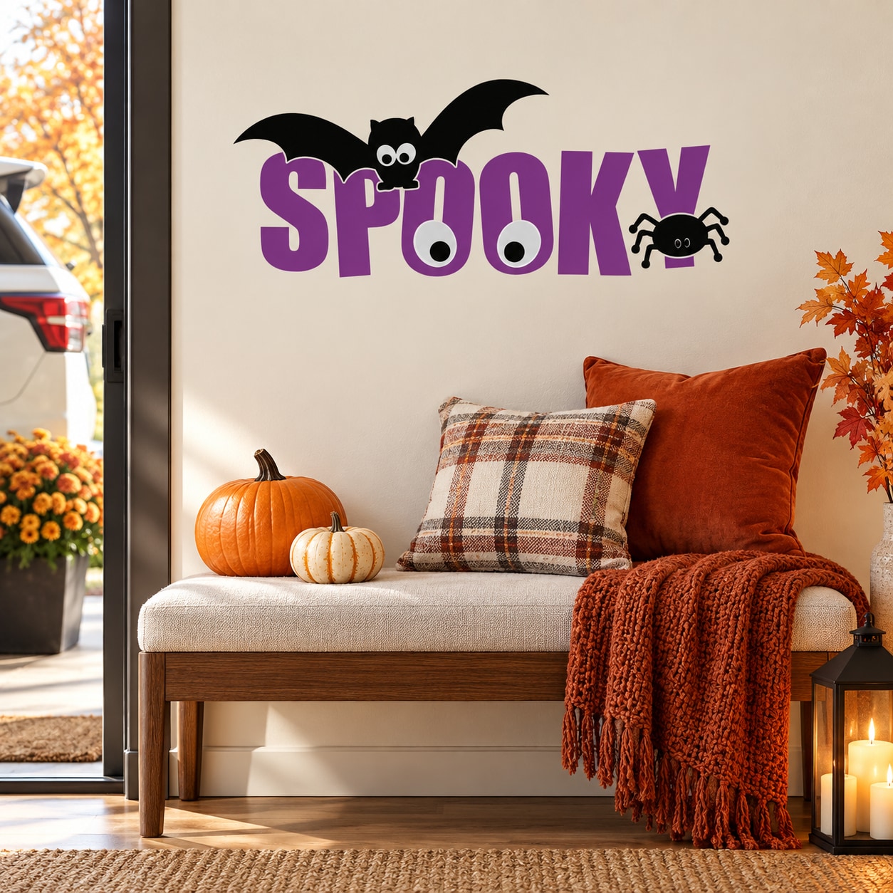 Halloween word decal with bat and spider, purple “Spooky” lettering