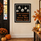 Halloween jack-o-lantern wall decal with white pumpkin faces and orange text on black