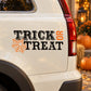 Halloween “TRICK OR TREAT” decal with orange spiderweb web graphic on light car panel
