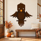 Brown owl die-cut decal with orange beak and white eyes, flat printed design