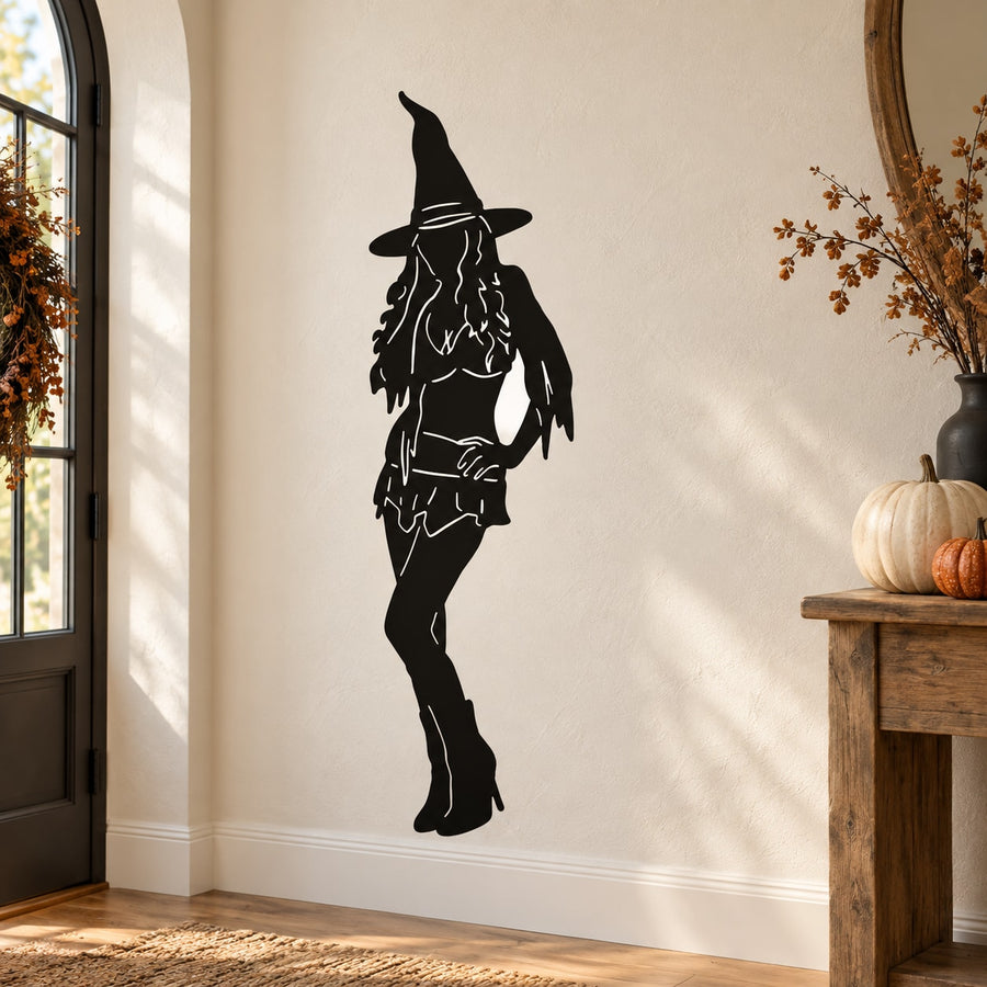 Black witch silhouette wall decal in a flirting pose, tall hat and long hair