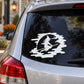 White riding witch decal on dark car rear window glass