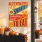 Halloween typographic sticker with orange, teal, purple text and pumpkin icons