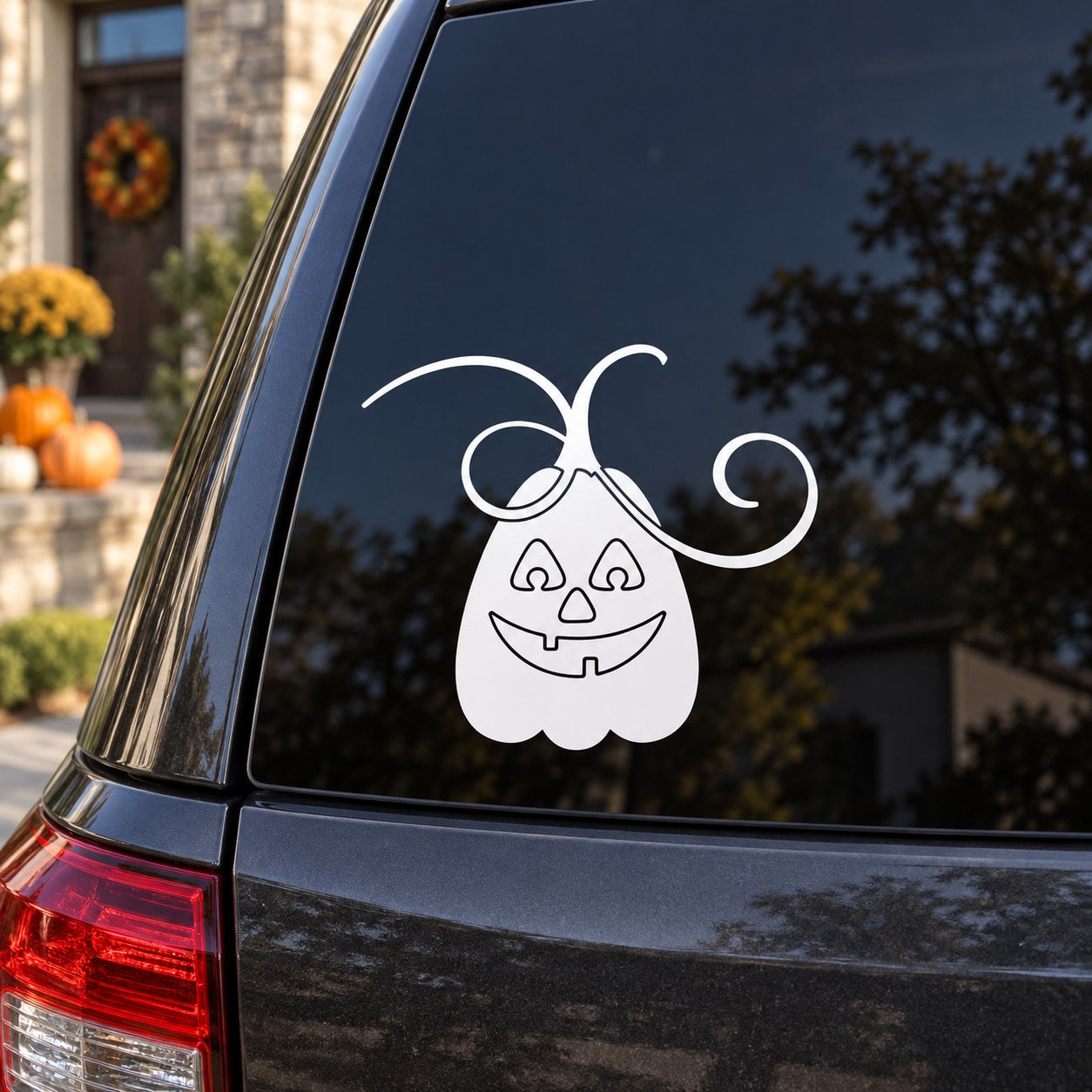 Halloween jack-o-lantern decal with curling wild-vine tendrils, white