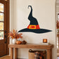 Black witch hat die-cut decal with red band and yellow buckle, standalone wall sticker