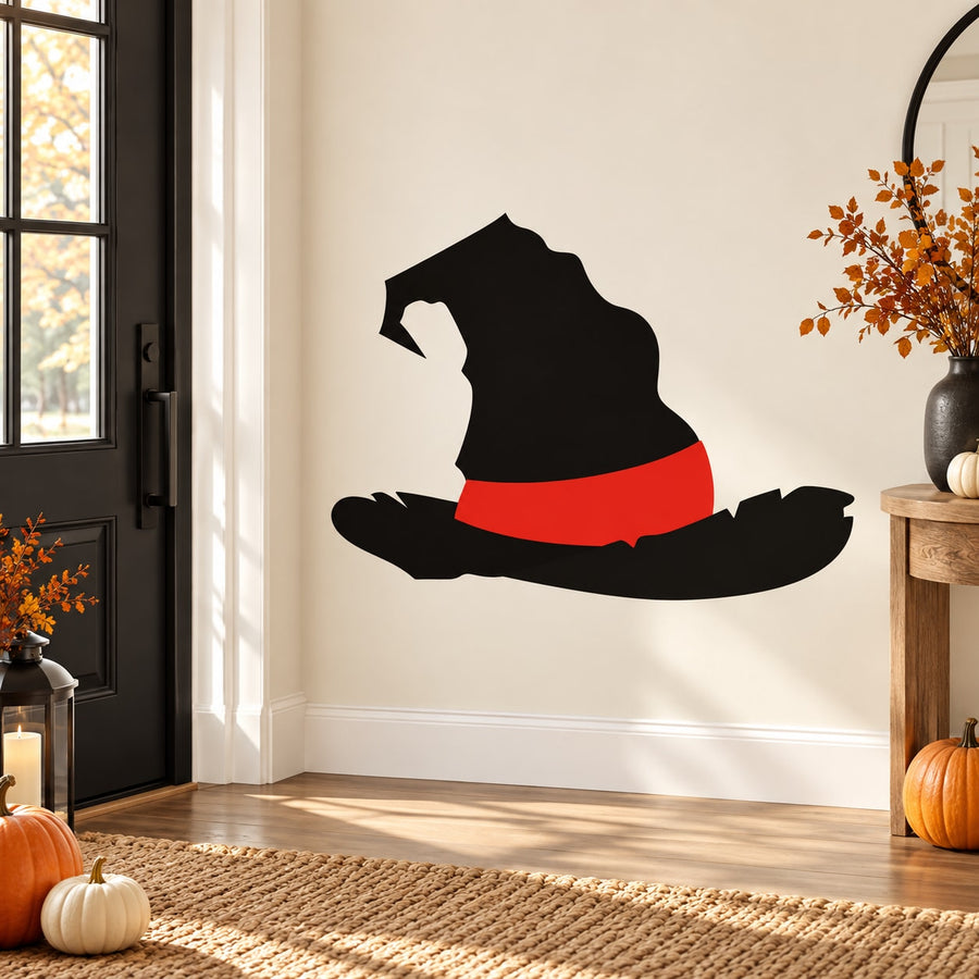 Black witch hat sticker with red band and tattered brim silhouette