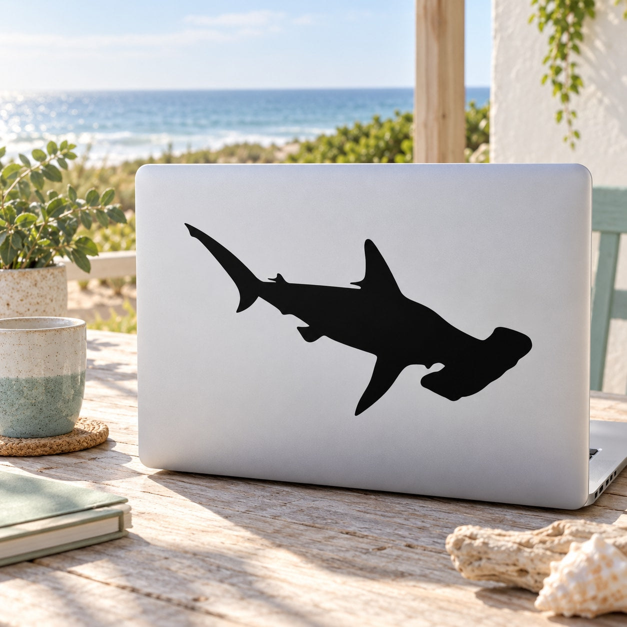 Swimming shark decal with black silhouette on light rectangular surface