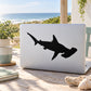 Swimming shark decal with black silhouette on light rectangular surface