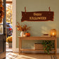 Halloween plank sign sticker with ribbon banner reading “Happy HALLOWEEN”
