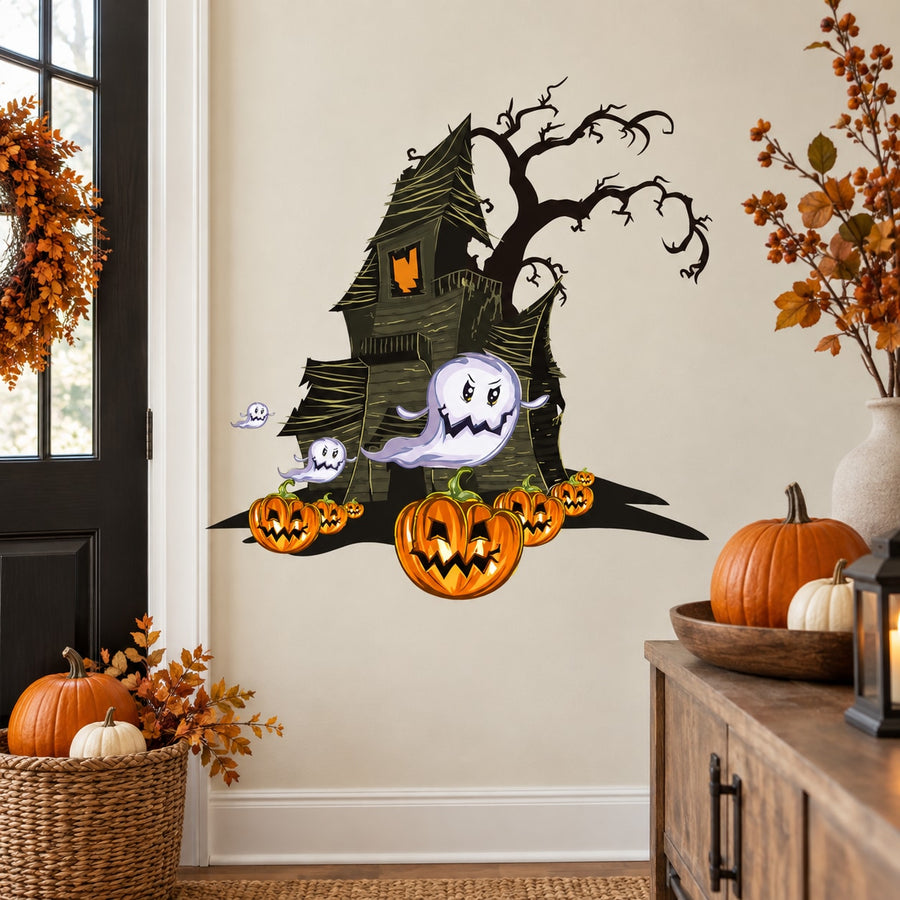 Halloween haunted house die-cut decal with ghost silhouettes and glowing jack-o'-lanterns
