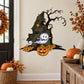 Halloween haunted house die-cut decal with ghost silhouettes and glowing jack-o'-lanterns