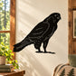 Black standing hawk silhouette wall decal with watching profile