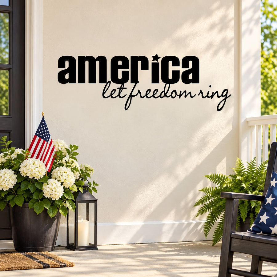 America wall decal with black "america" and "let freedom ring" script text