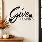 Thanksgiving leaves wall decal with black "Give Thanks" lettering