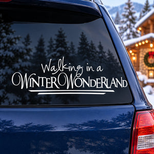 Winter wonderland quote decal with white lettering on dark car window