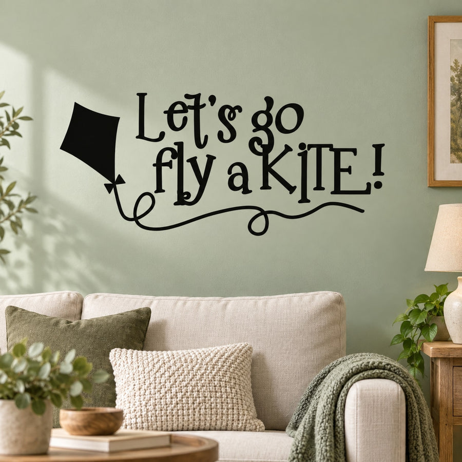 Let’s go fly a kite wall decal with black kite, ribbon, and bold script text