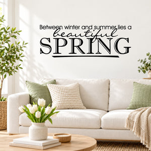 Wall decal: 'Between winter and summer lies a beautiful spring' with large 'SPRING'