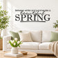 Wall decal: 'Between winter and summer lies a beautiful spring' with large 'SPRING'