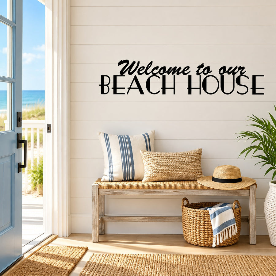 Black wall decal: "Welcome to our Beach House" in script and uppercase letters