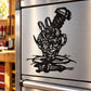 Black needle and screw-head stylized tool decal on brushed metal surface