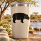 Black hippo looking decal on light tumbler surface