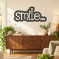 Smile word wall decal in bold black with cloud-outline lettering