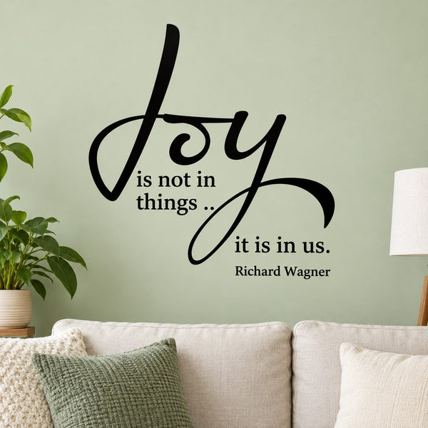 Black script wall decal with “joy is not in things... it is in us” and Richard Wagner