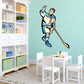 Hockey player wall decal vinyl sticker, cartoon athlete holding hockey stick