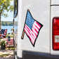 Die-cut vinyl sticker of an American flag waving