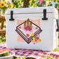 Birthday cake sticker on white cooler, colorful candles and confetti
