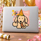Holiday birthday puppy sticker with a beige dog wearing a yellow party hat and confetti