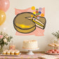 Cartoon slice of cake sticker with sprinkles on a pink square background