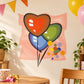 Heart-shaped balloon sticker with red and green balloons, strings, and confetti dots