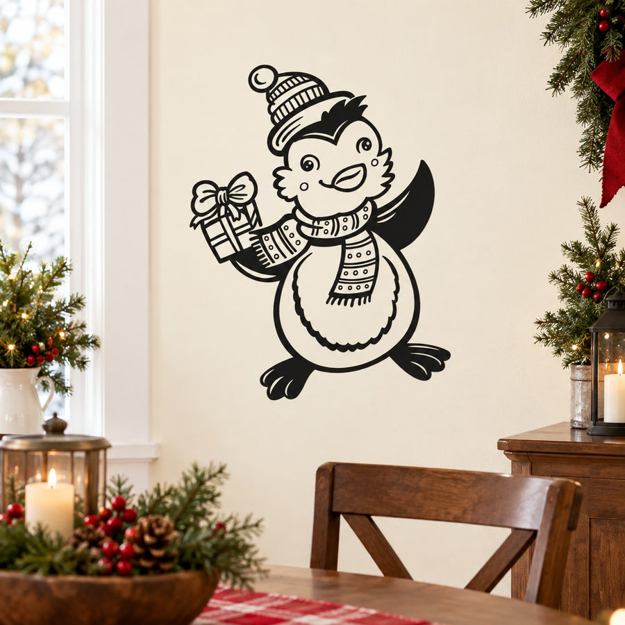 Christmas penguin wall decal holding a gift, wearing a striped hat and scarf