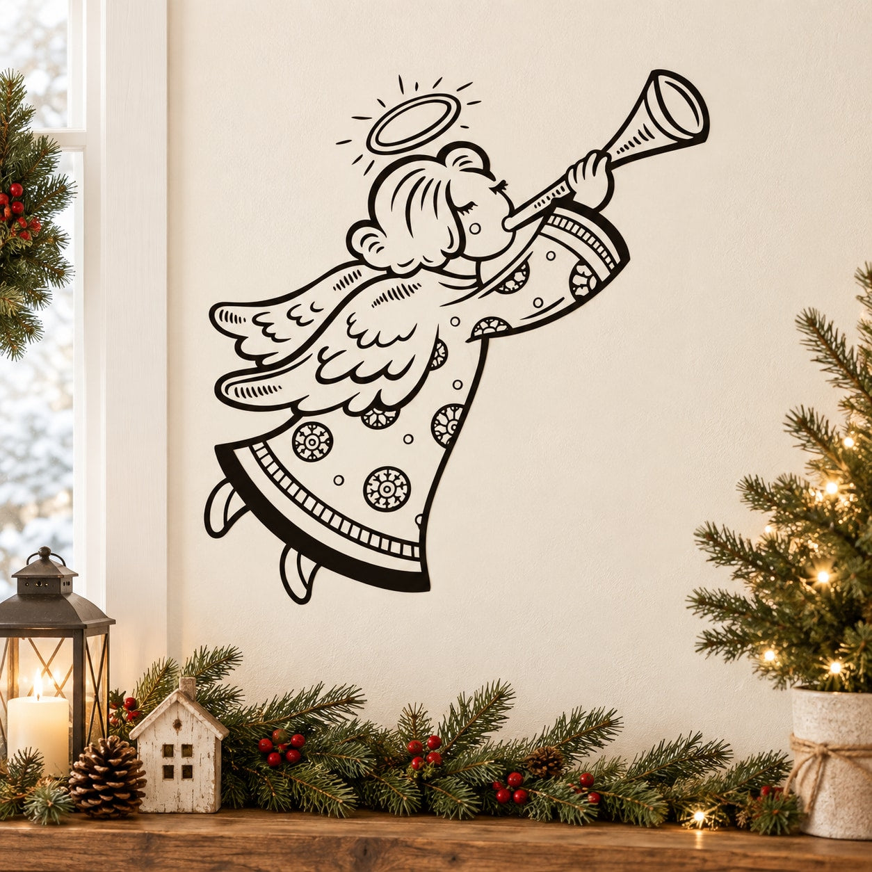 Christmas angel decal blowing a horn, black line art with wings and halo