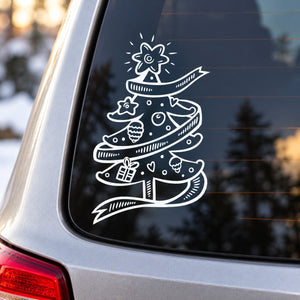 Christmas tree ribbon decal with white outline on dark car window