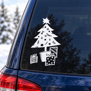 Christmas tree and present decal, white design on dark car rear window