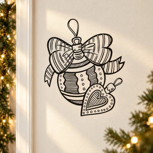 Christmas vinyl sticker with ribbon bow and heart ornament outline, black on light background