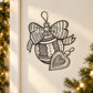 Christmas vinyl sticker with ribbon bow and heart ornament outline, black on light background