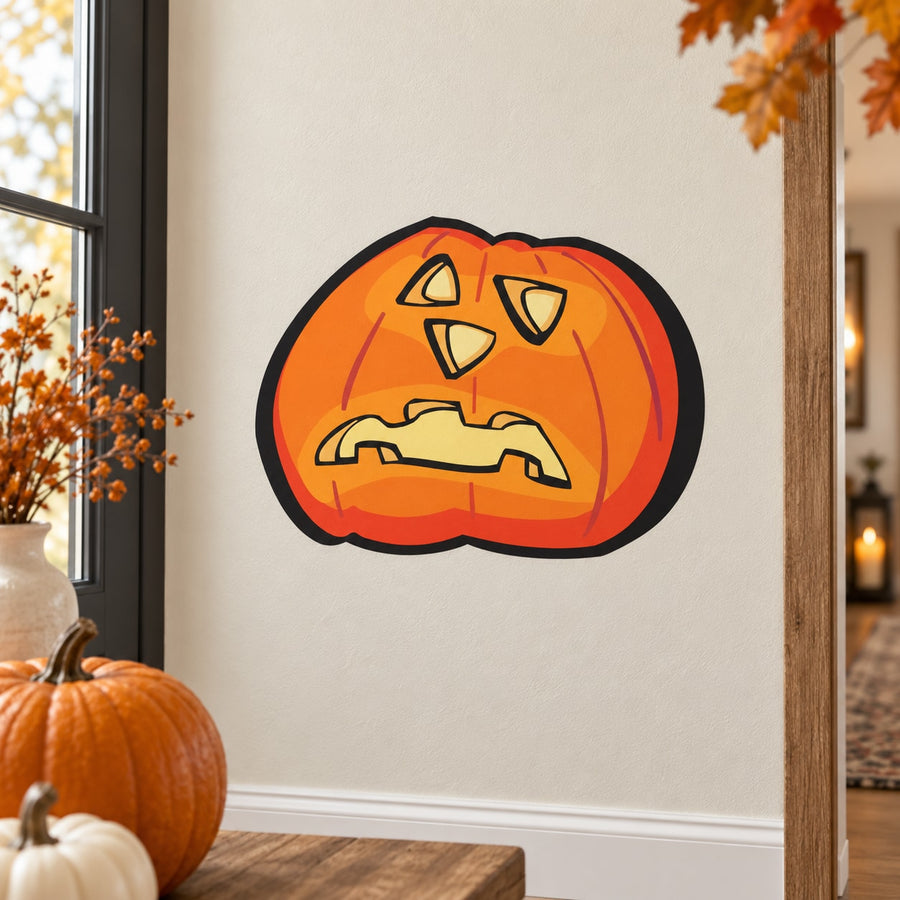 Orange jack-o-lantern sticker with black outline and carved spooky face