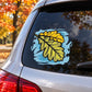 Yellow fall leaves vinyl car sticker on car rear window, blue splash background