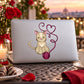 Cat with yarn heart decal on a light surface