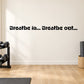 Wall decal with bold text: “Breathe in... Breathe out...”