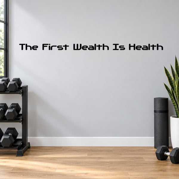 Wall decal with black text: 'The First Wealth Is Health'
