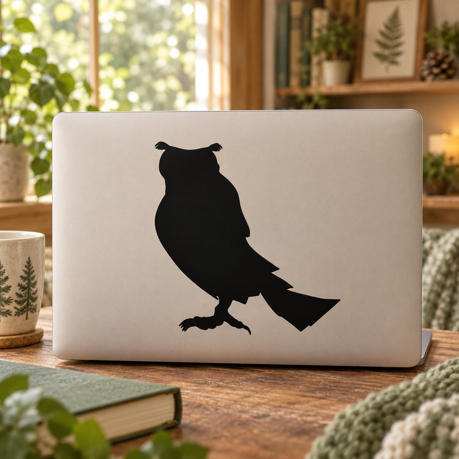 Black horned owl silhouette watching decal on a laptop